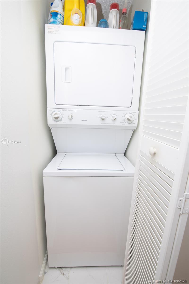 6607 Via Regina Boca Raton, FL 33433 - Photo 20 of 40 a utility room with dryer and washer