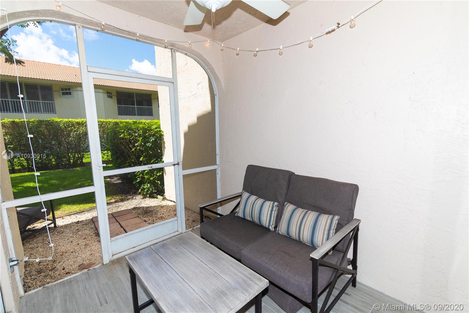6607 Via Regina Boca Raton, FL 33433 - Photo 30 of 40 a view of a living room and wooden floor