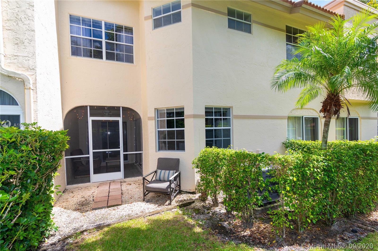 6607 Via Regina Boca Raton, FL 33433 - Photo 32 of 40 a house view with a garden space