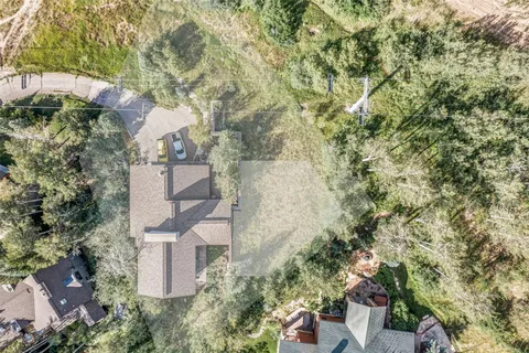 an aerial view of residential house with outdoor space
