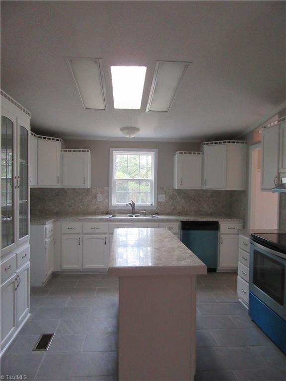 Kitchen.  Laundry room to the right