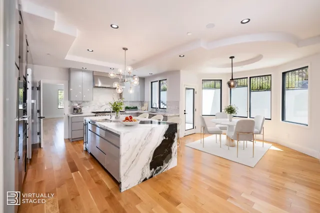 a living room with furniture pool table and a rug
