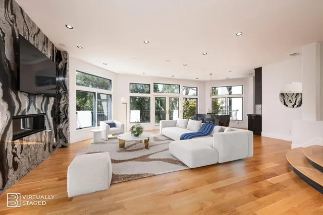 a view of a living room and dining room