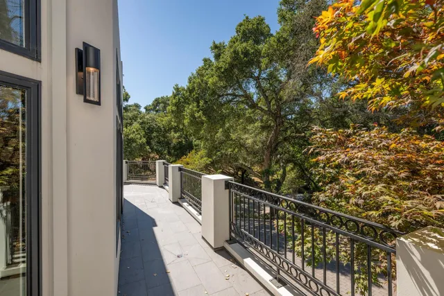a spacious bedroom with a bed and a window