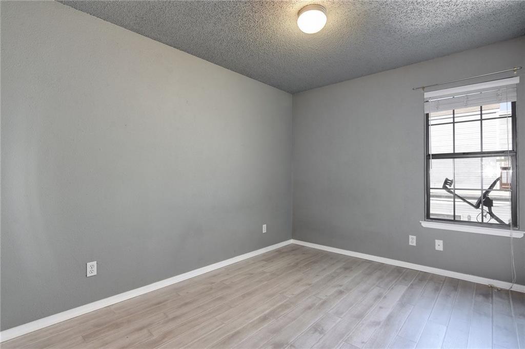 1010 West Rundberg Lane, Unit 17 Austin, TX 78758 - Photo 19 of 25 Spare Bedroom