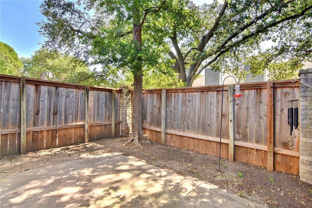 1010 West Rundberg Lane, Unit 17 Austin, TX 78758 - Photo 21 of 25 View of fenced backyard