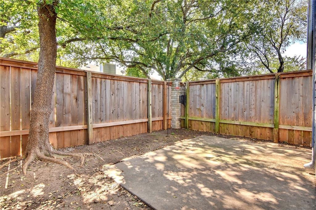 1010 West Rundberg Lane, Unit 17 Austin, TX 78758 - Photo 23 of 25 View of fenced backyard