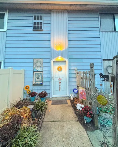 a front view of a house with patio