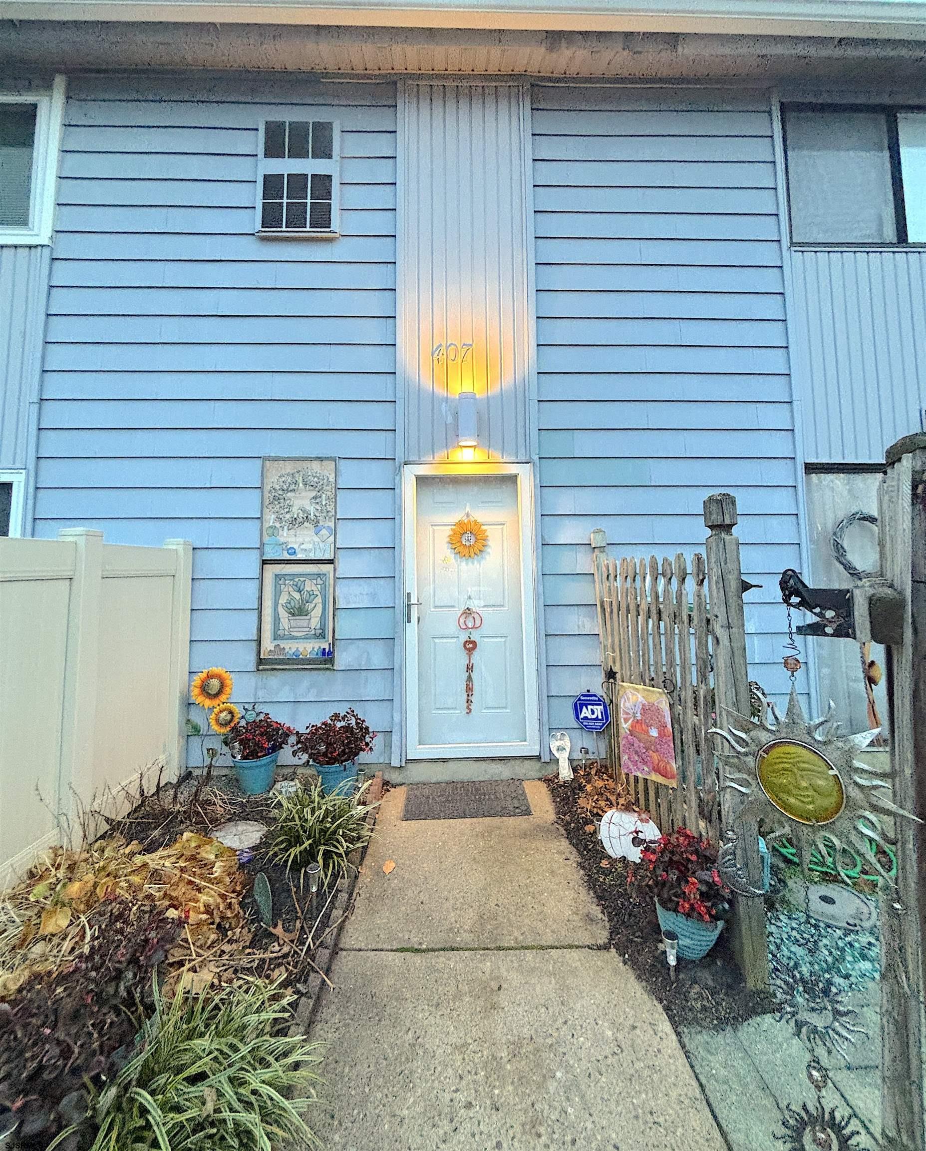 a front view of a house with patio