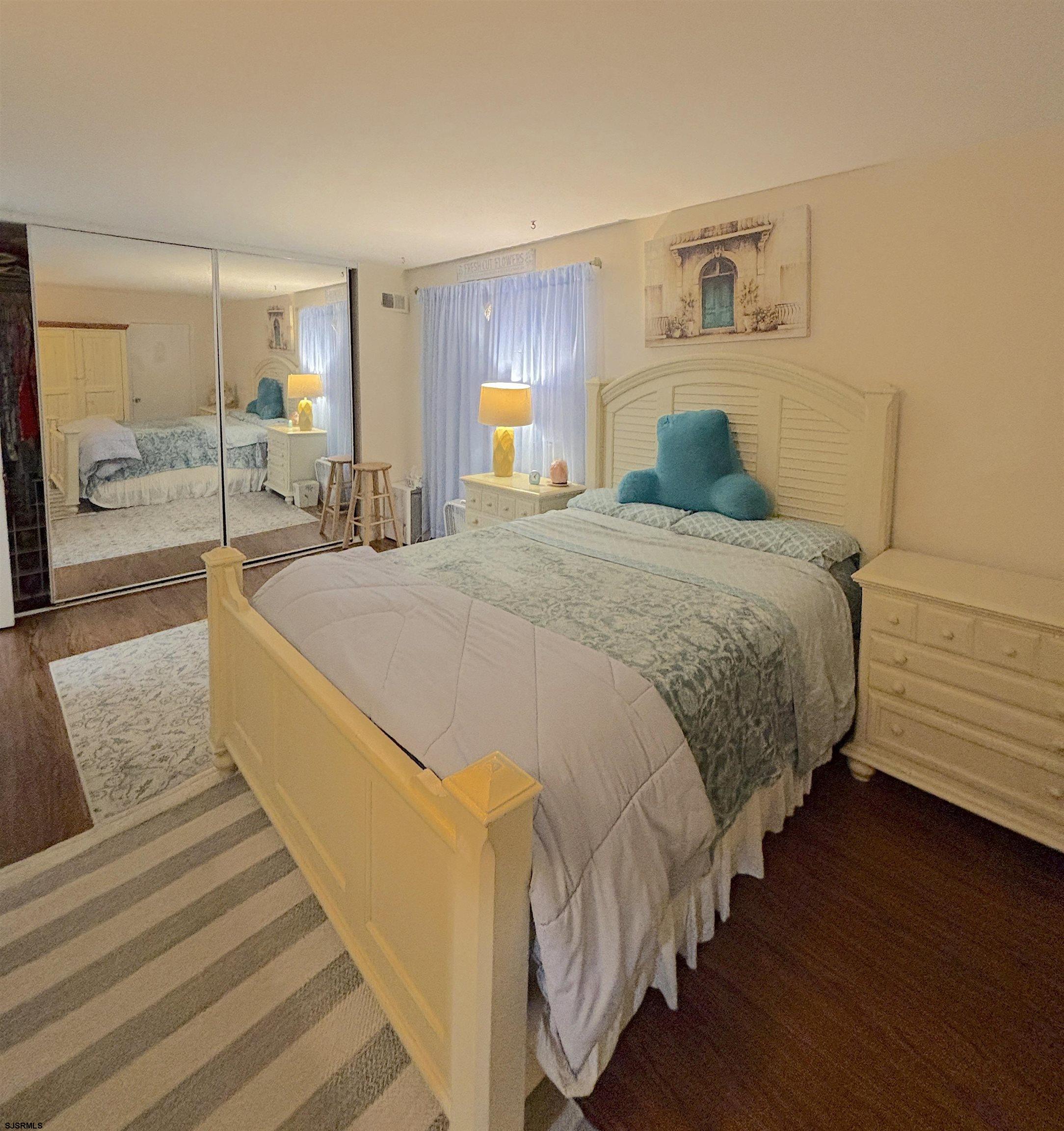 407 Mason Run, Unit 407 Clementon, NJ 08021 - Photo 14 of 22 a spacious bedroom with bed and a dresser