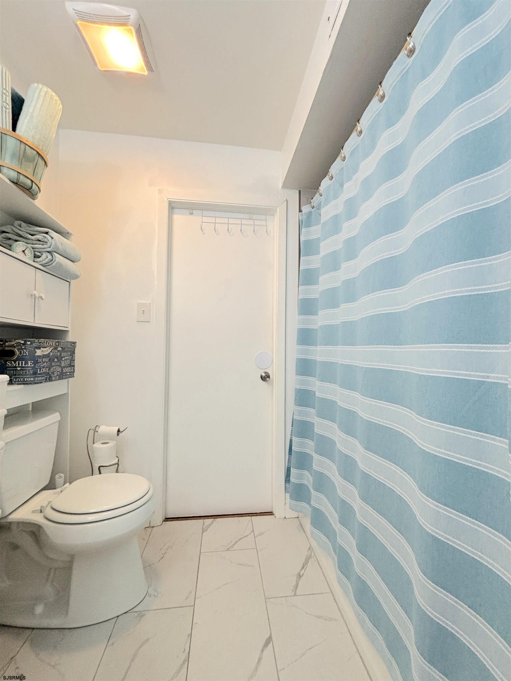 407 Mason Run, Unit 407 Clementon, NJ 08021 - Photo 18 of 22 a bathroom with a toilet and a shower