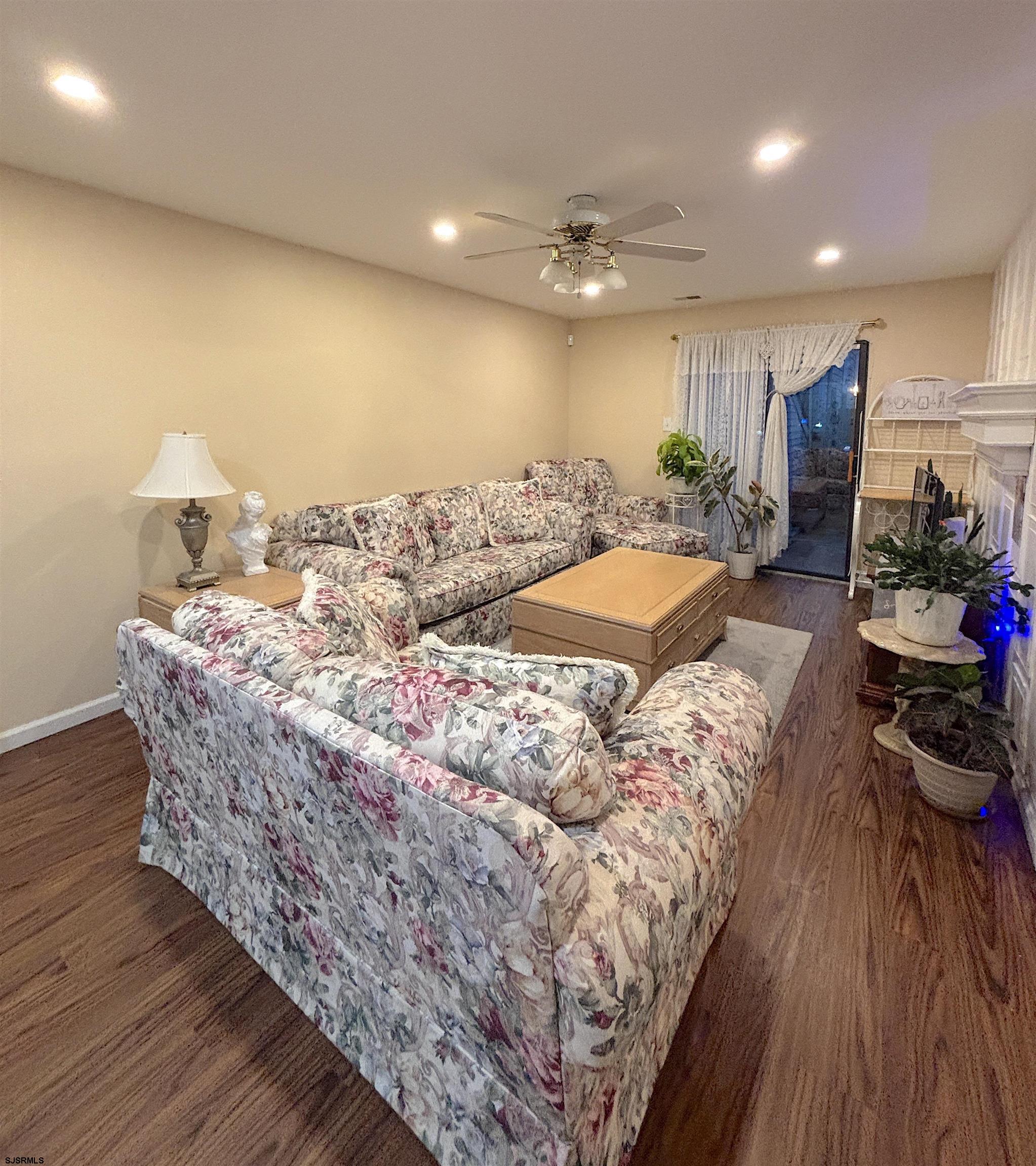 407 Mason Run, Unit 407 Clementon, NJ 08021 - Photo 8 of 22 a living room with furniture and a wooden floor