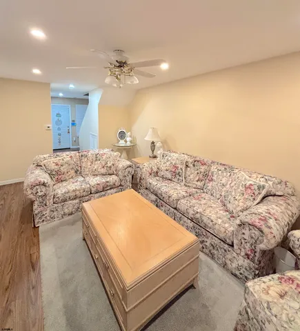 a living room with a bed