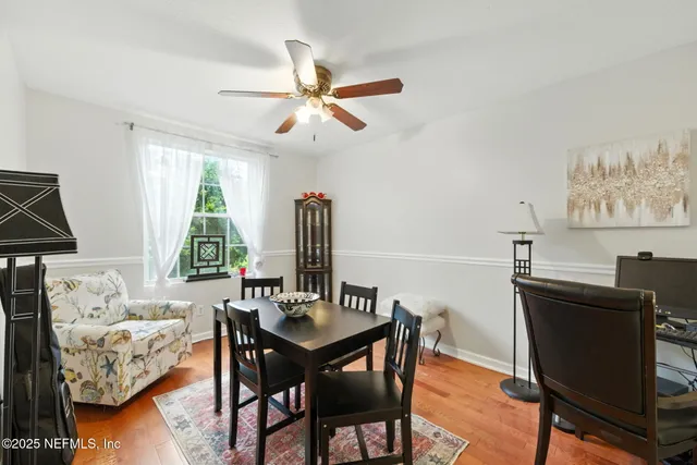a view of a livingroom with furniture and window