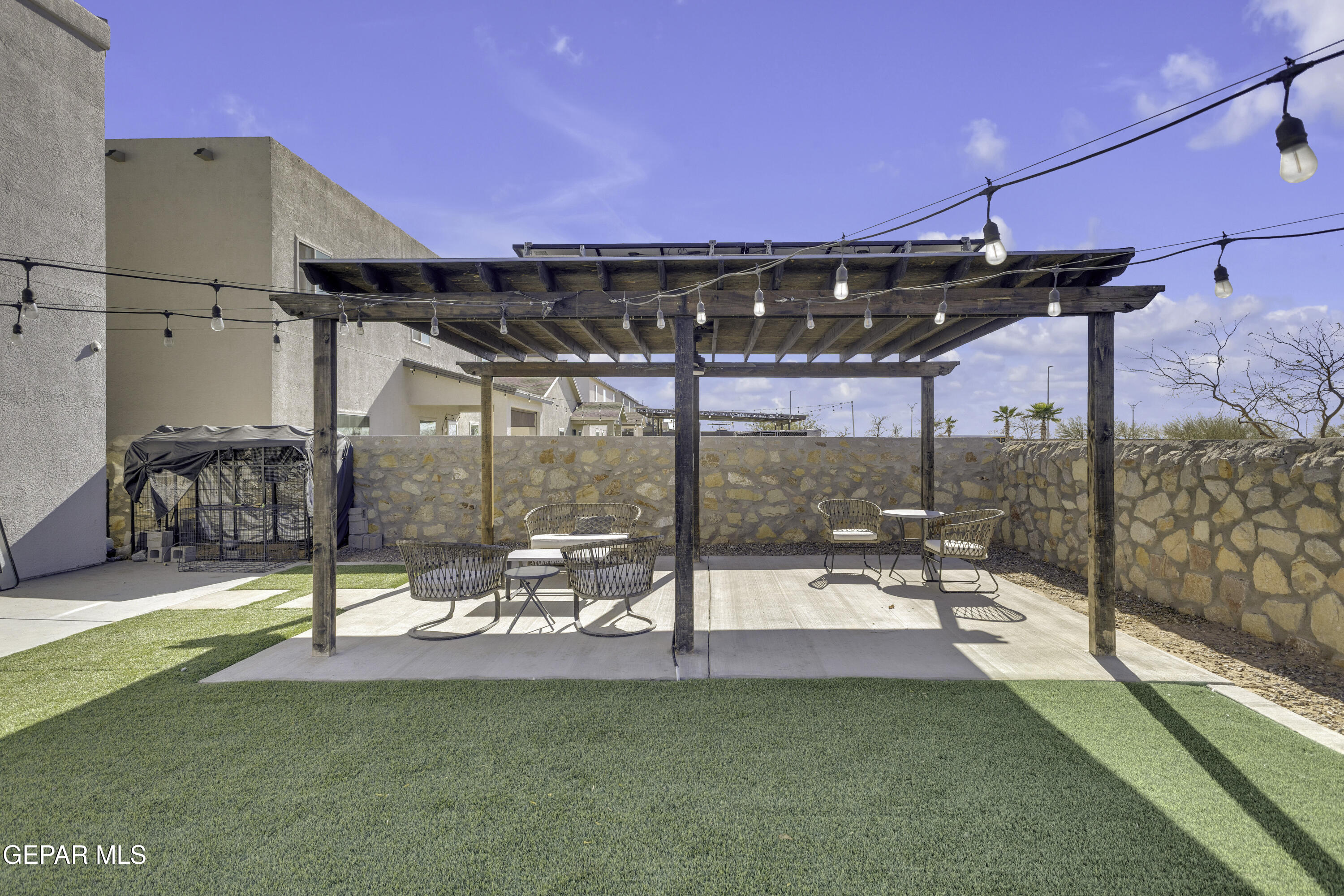 3529 Essence Street El Paso, TX 79938 - Photo 18 of 23 a view of a swimming pool with a patio
