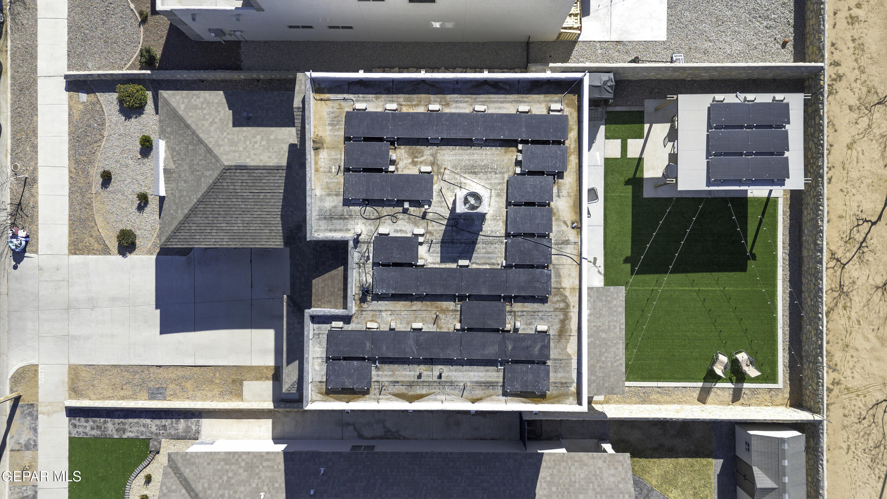 3529 Essence Street El Paso, TX 79938 - Photo 22 of 23 a living room with a table and chairs