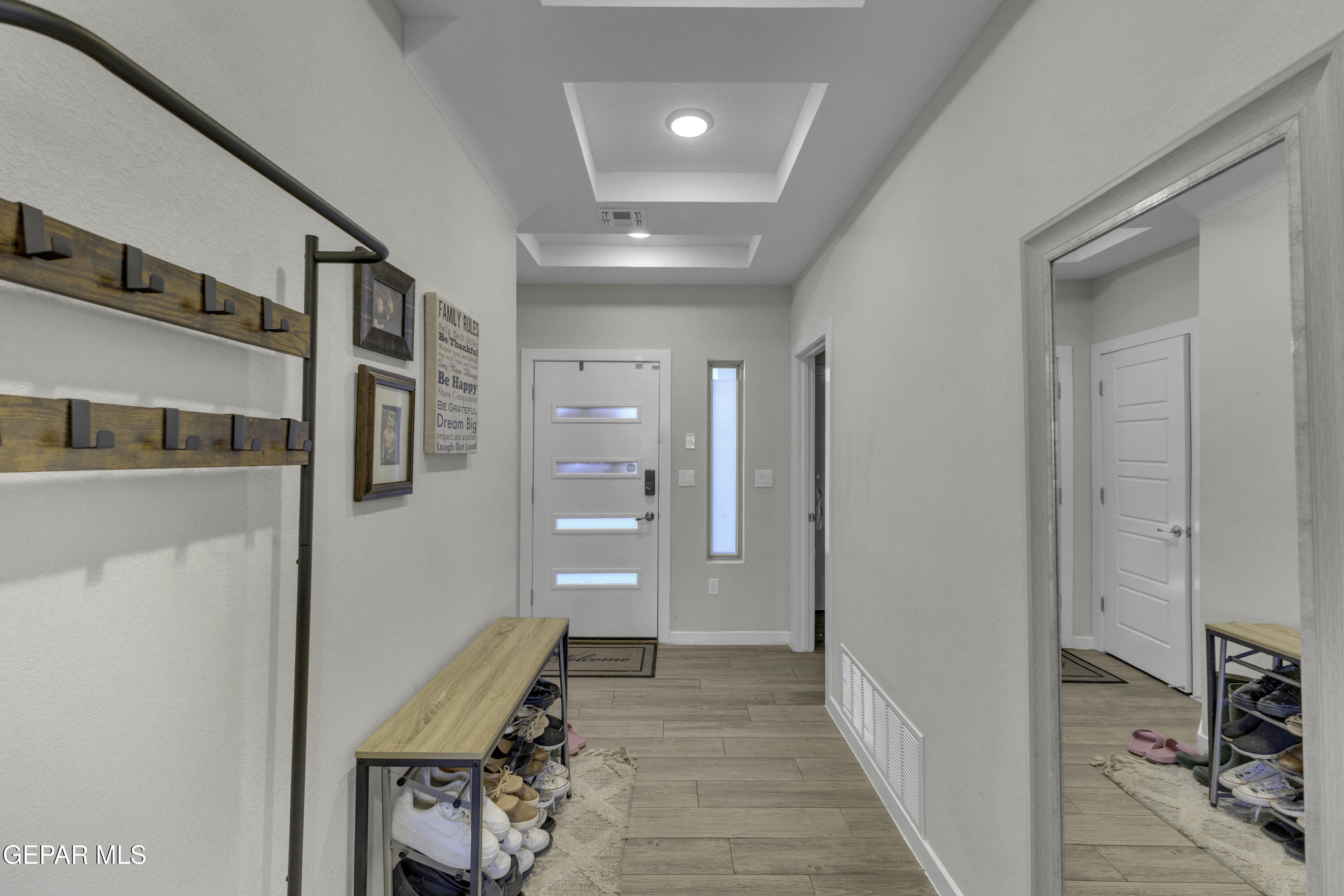 3529 Essence Street El Paso, TX 79938 - Photo 3 of 23 a view of a hallway with workspace and entryway