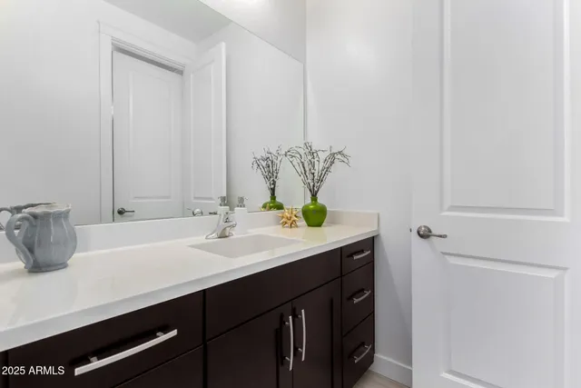 a view of kitchen and dining room with wooden floor