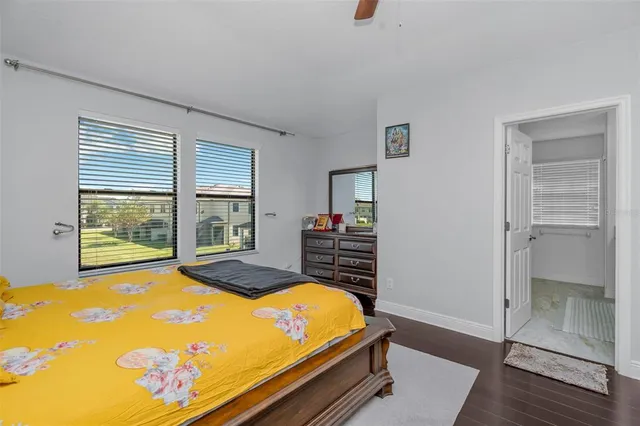 a bed room with a bed and a window