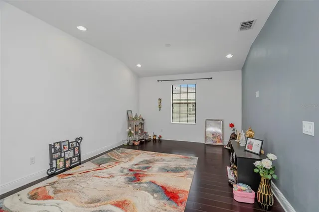a very nice looking bedroom with a bed