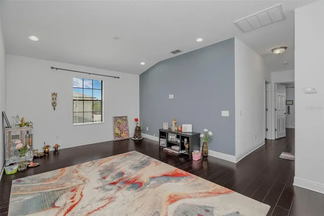 a bed room with a bed and a table