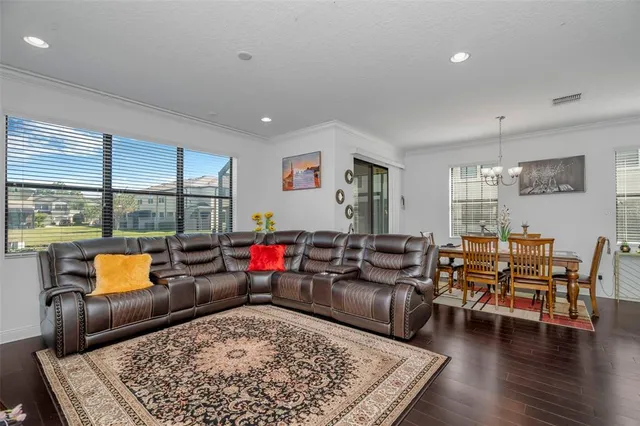 a living room with furniture and a table