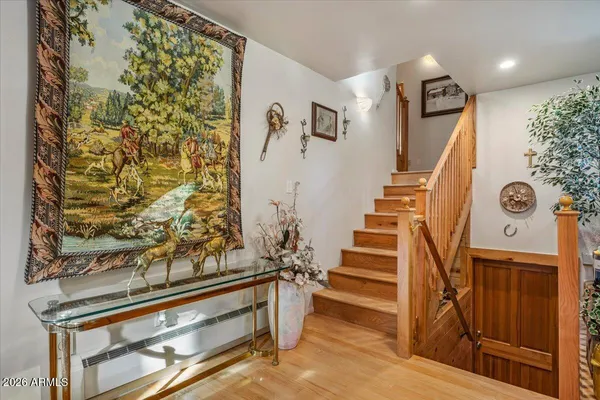 a bed room with a bed and a chair