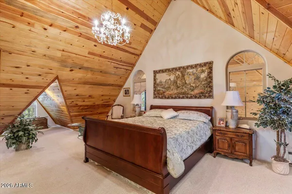 a spacious bathroom with a double vanity sink mirror and shower