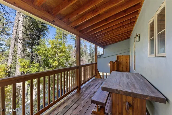 a view of a house with a tree