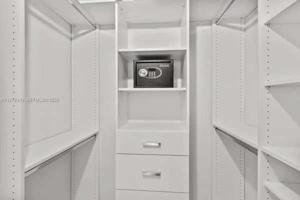 a bathroom with a shower and a toilet