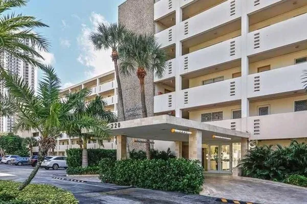 a view of a building with a street