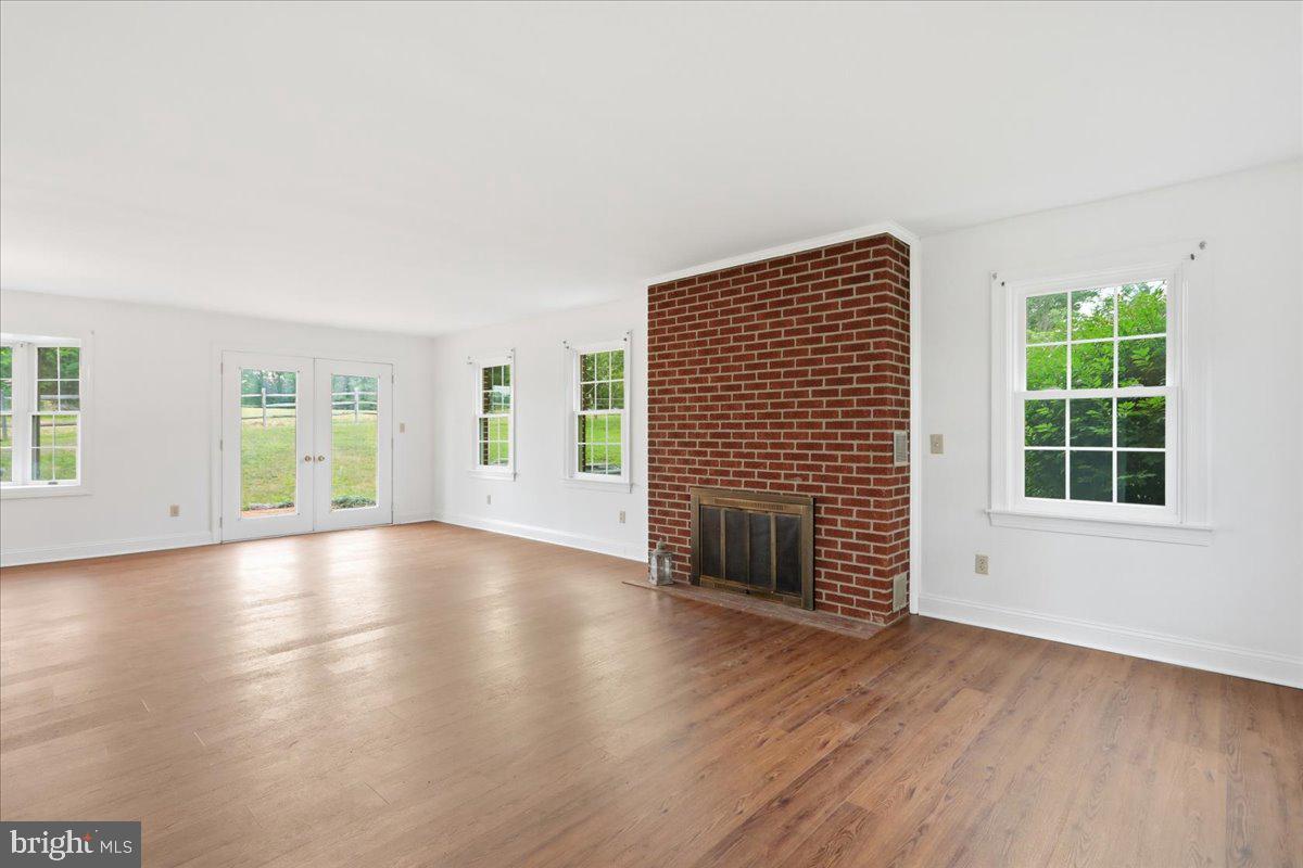 2447 Headquarters Road Edinburg, VA 22824 - Photo 10 of 58 Living Room wood burning fireplace