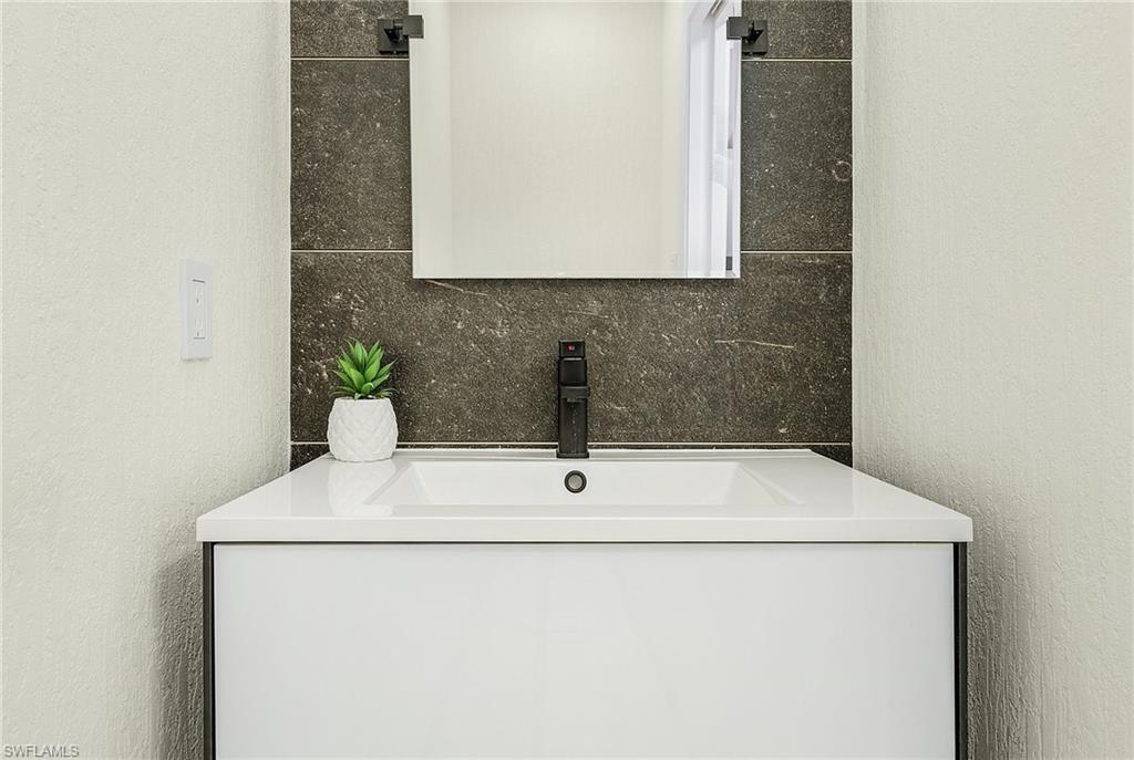 1601 Weybridge Circle, Unit 11 Naples, FL 34110 - Photo 20 of 34 a close view of sink