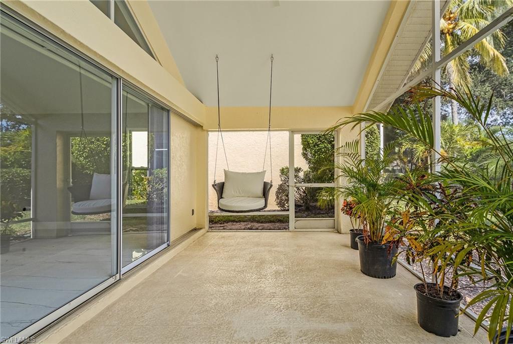 1601 Weybridge Circle, Unit 11 Naples, FL 34110 - Photo 22 of 34 a view of an outdoor space and porch
