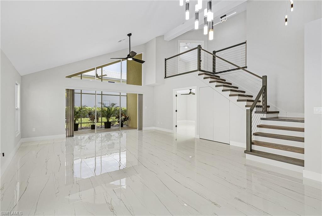 1601 Weybridge Circle, Unit 11 Naples, FL 34110 - Photo 3 of 34 a view of entryway and kitchen