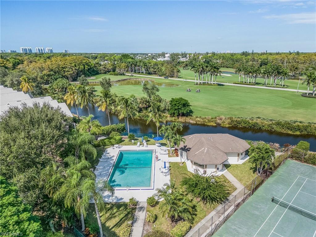 1601 Weybridge Circle, Unit 11 Naples, FL 34110 - Photo 33 of 34 a view of a city and lake view
