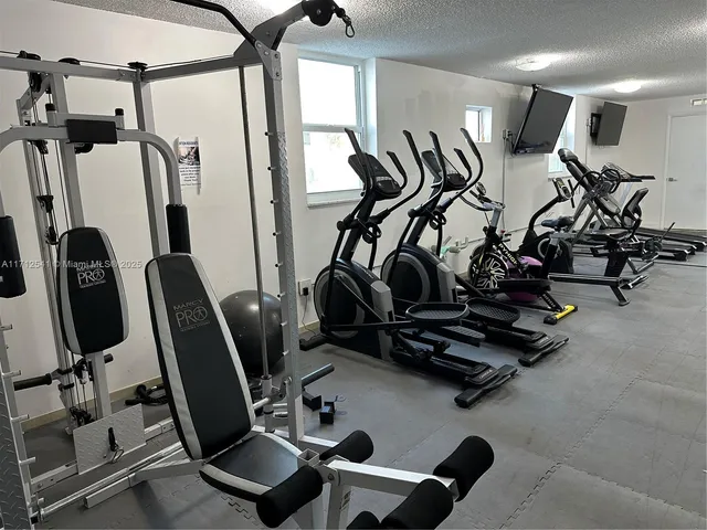 a view of a room with gym equipment