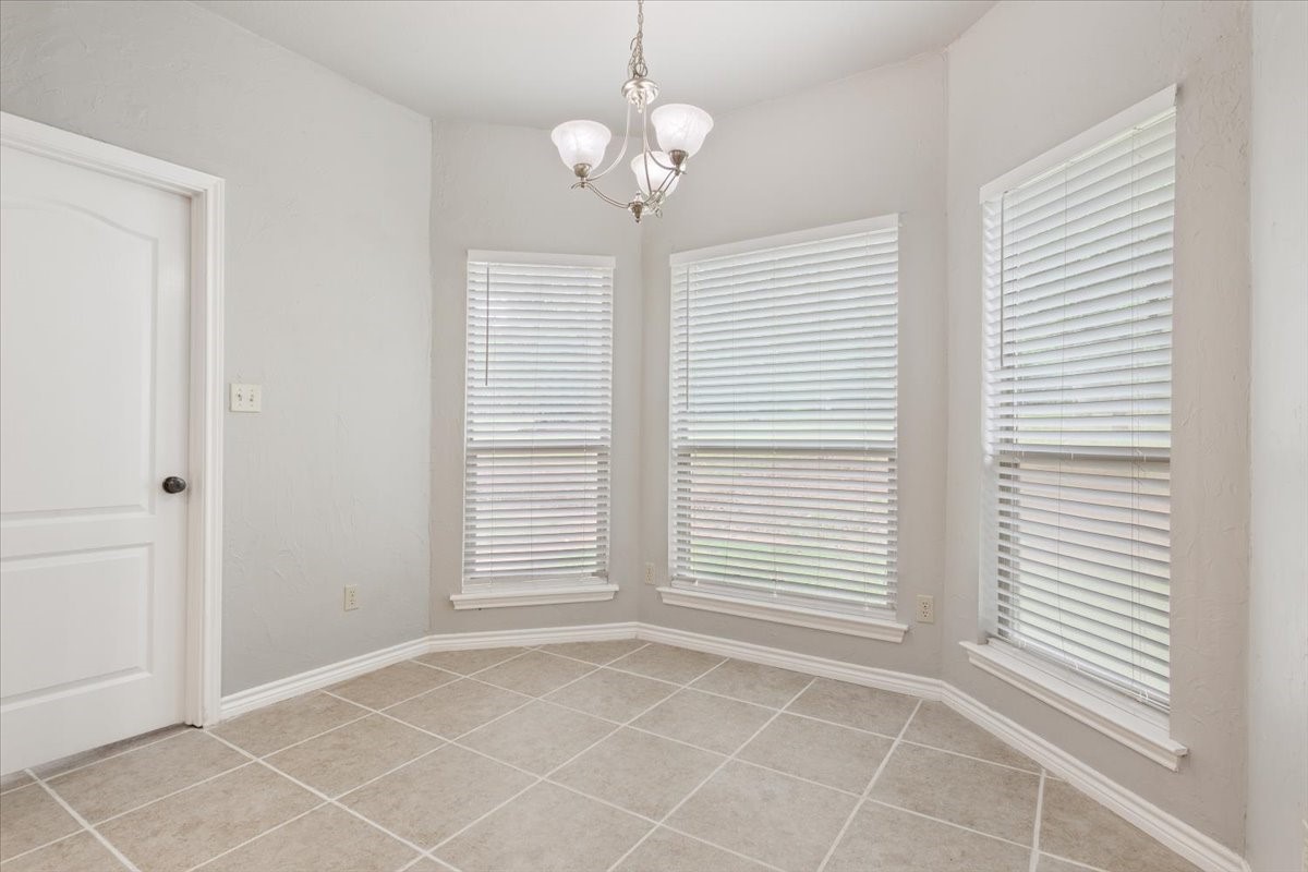 140 Oak Ridge Loop Whitney, TX 76692 - Photo 13 of 40 a view of an empty room with a window