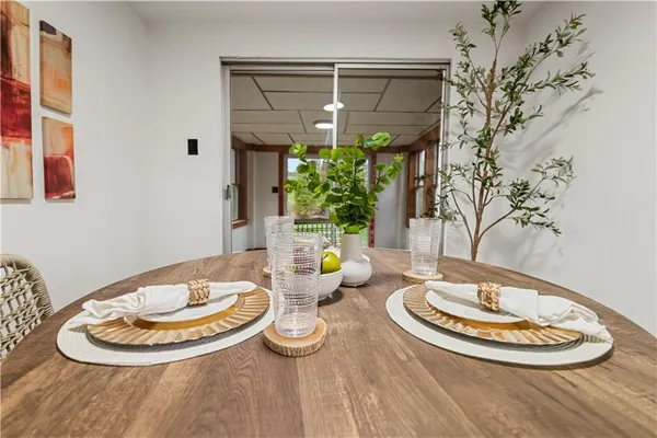 a table and chairs in a dining room