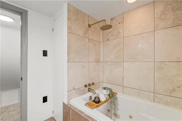 a bathroom with a sink and a shower