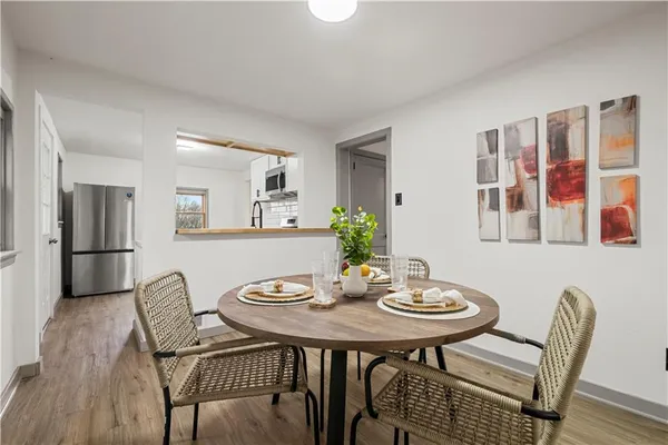 a view of a dining room with furniture