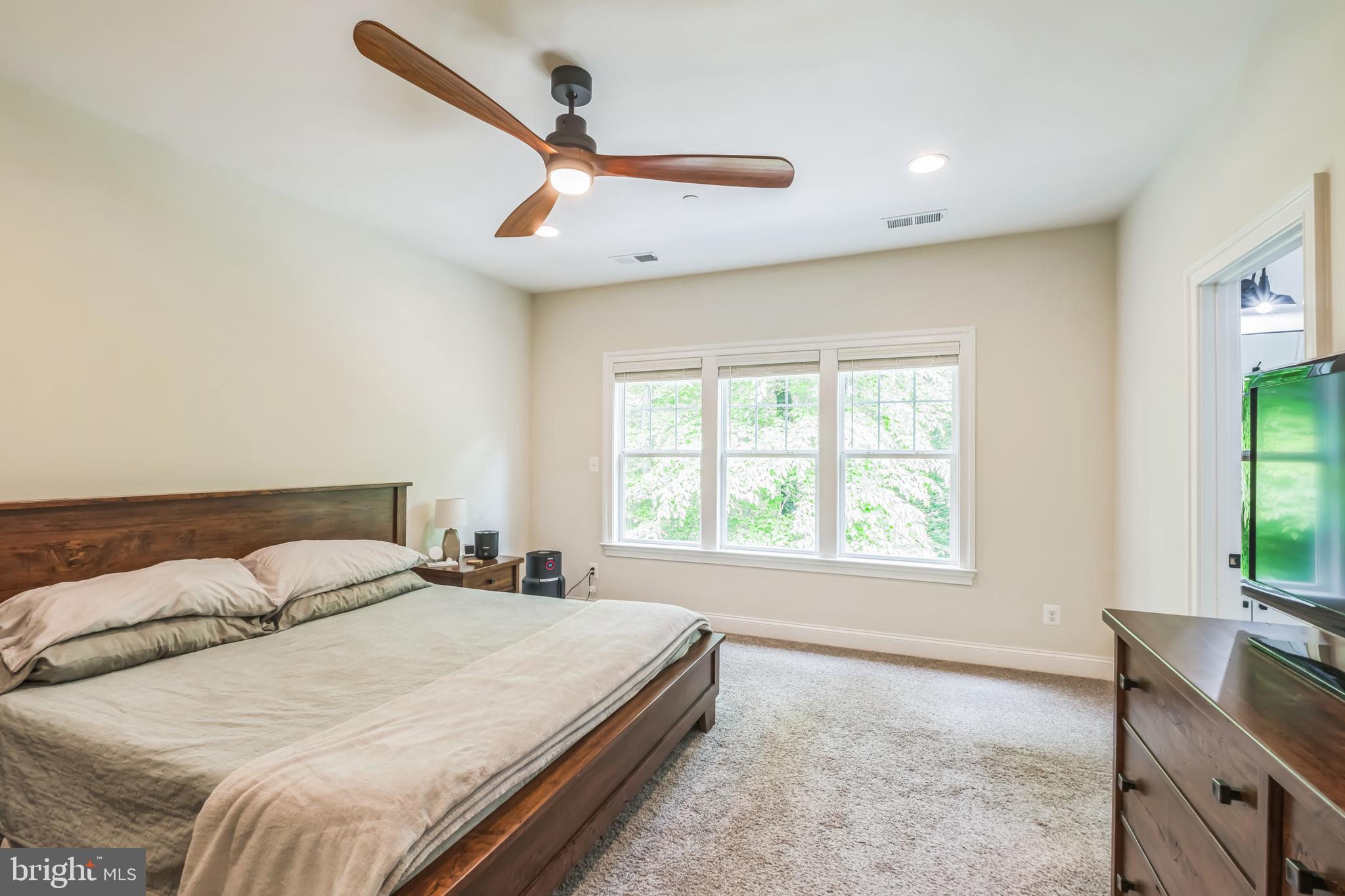 166 Nutwell Road Lothian, MD 20711 - Photo 14 of 29 a bedroom with a bed and a large window