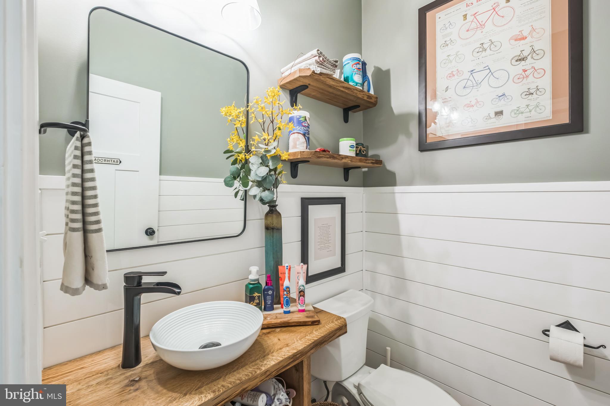 166 Nutwell Road Lothian, MD 20711 - Photo 21 of 29 a bathroom with a toilet sink and mirror