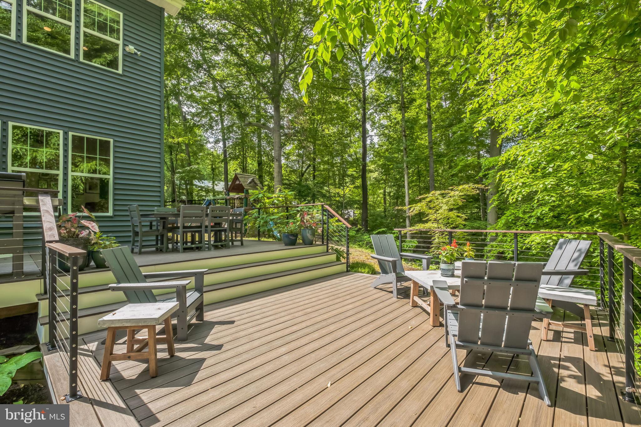 166 Nutwell Road Lothian, MD 20711 - Photo 25 of 29 a view of balcony with wooden floor and outdoor seating