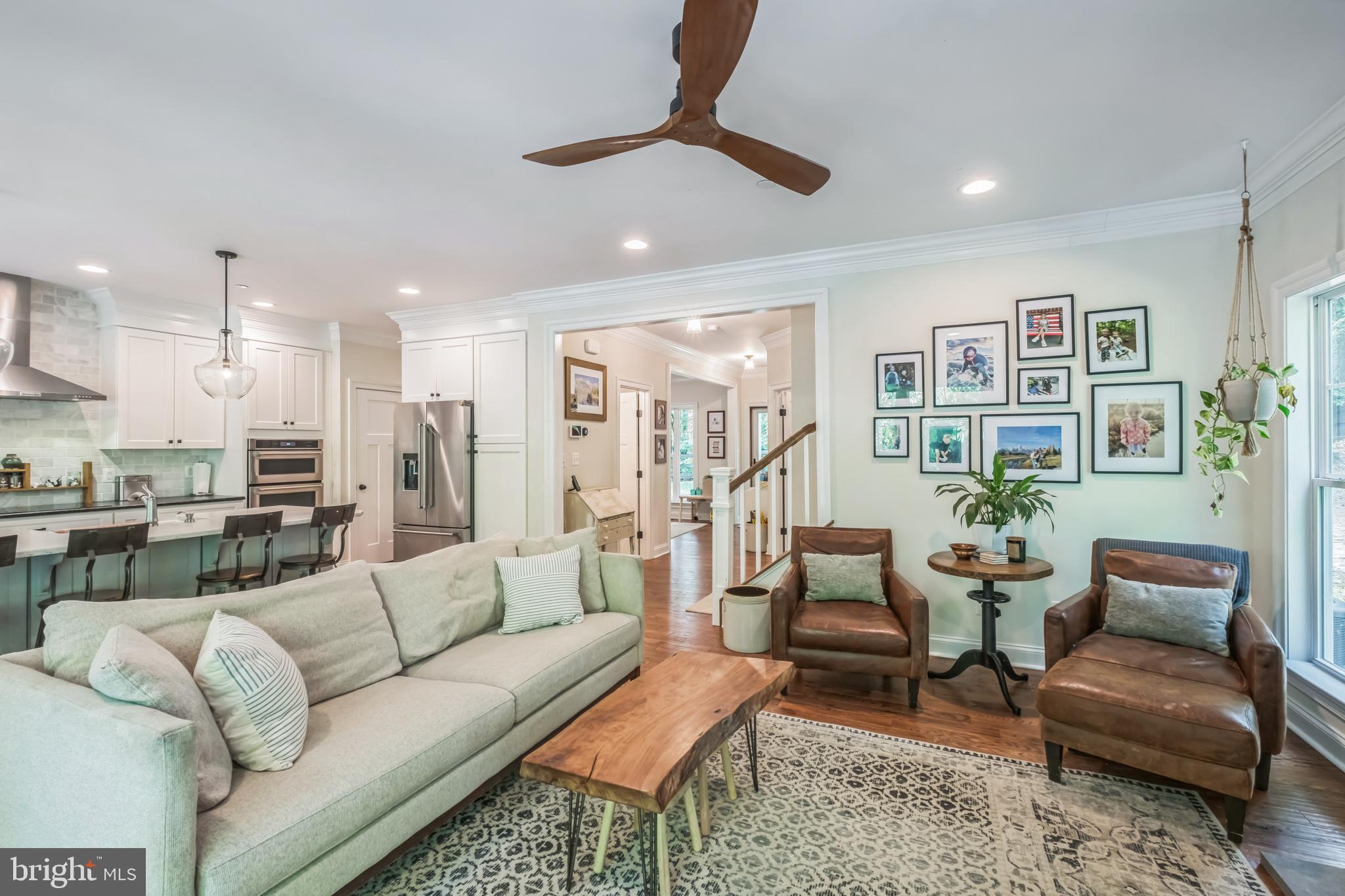 166 Nutwell Road Lothian, MD 20711 - Photo 8 of 29 a living room with furniture kitchen view and a chandelier