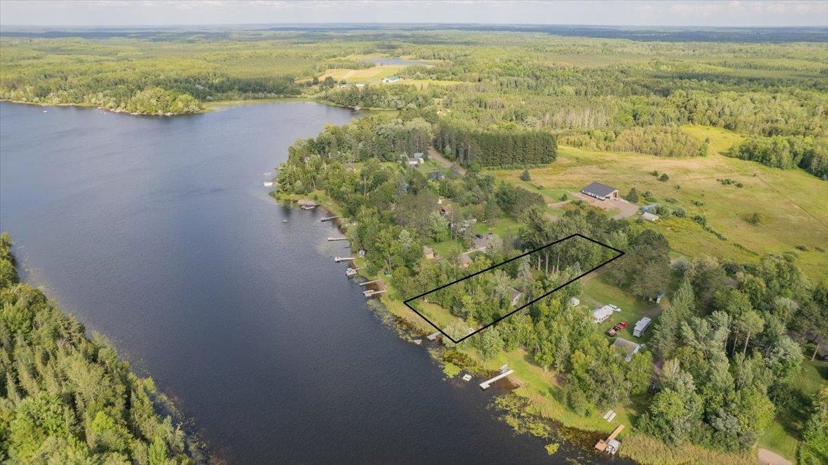 8977 Austin Road Alborn, MN 55702 - Photo 25 of 35 Aerial view of property's location featuring property boundaries highlighted and a large body of water
