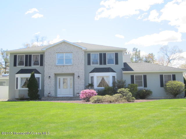 9 Georgetown Road Eatontown, NJ 07724 - Photo 1 of 33 a front view of house with yard and green space