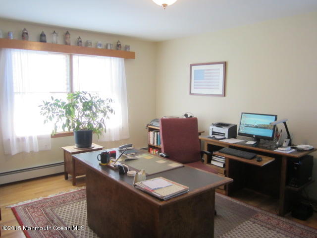 9 Georgetown Road Eatontown, NJ 07724 - Photo 26 of 33 a view of a workspace with furniture and a window