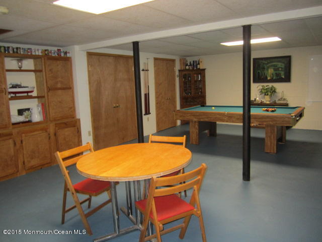 9 Georgetown Road Eatontown, NJ 07724 - Photo 30 of 33 a view of a dining room with furniture and wooden floor