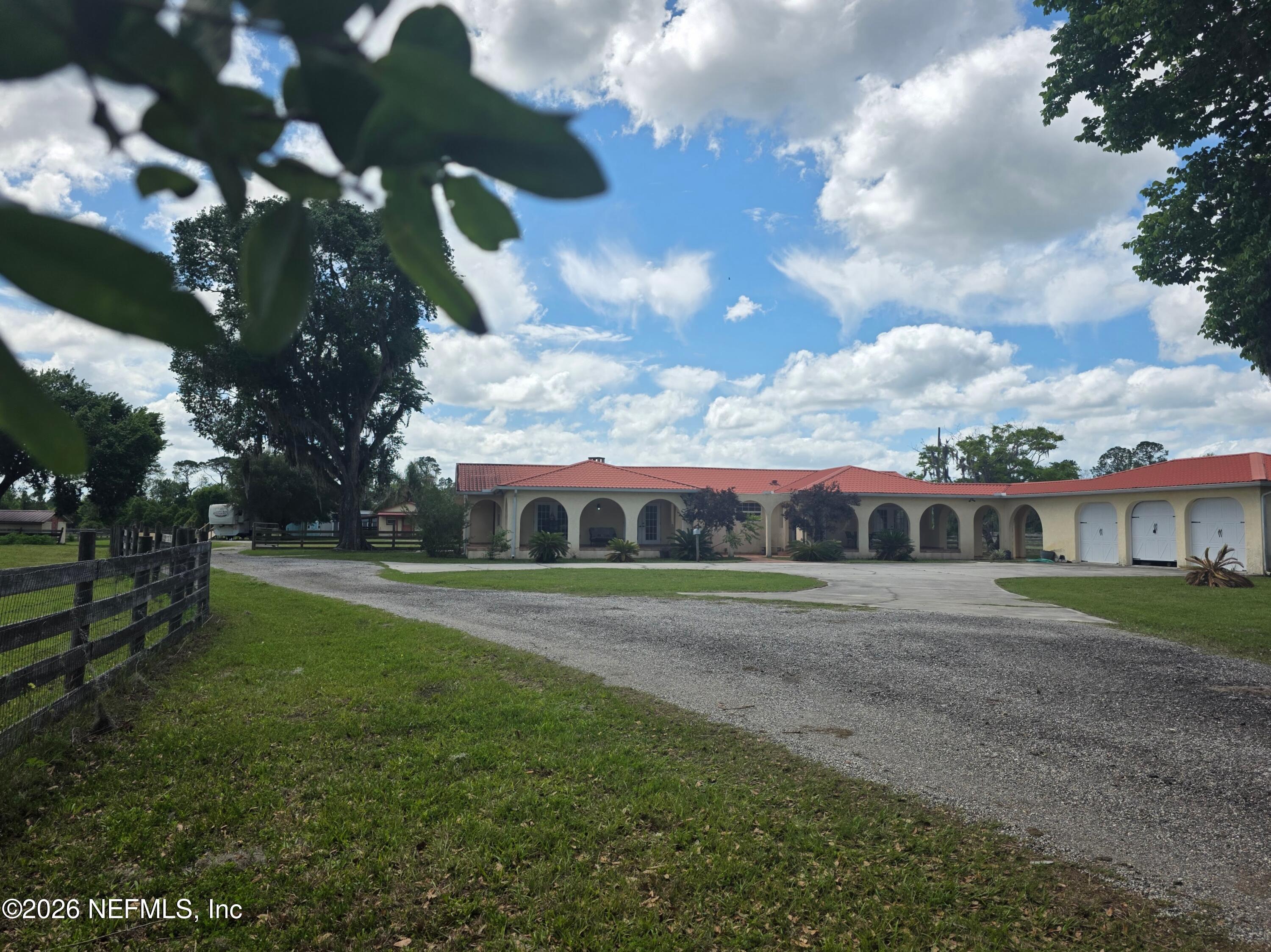 721 Bunnell Road Pierson, FL 32180 - Photo 3 of 59 a front view of house with yard and green space